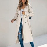 Belted double-breasted trench coat, front view