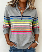 Colourful quarter-zip top, front view