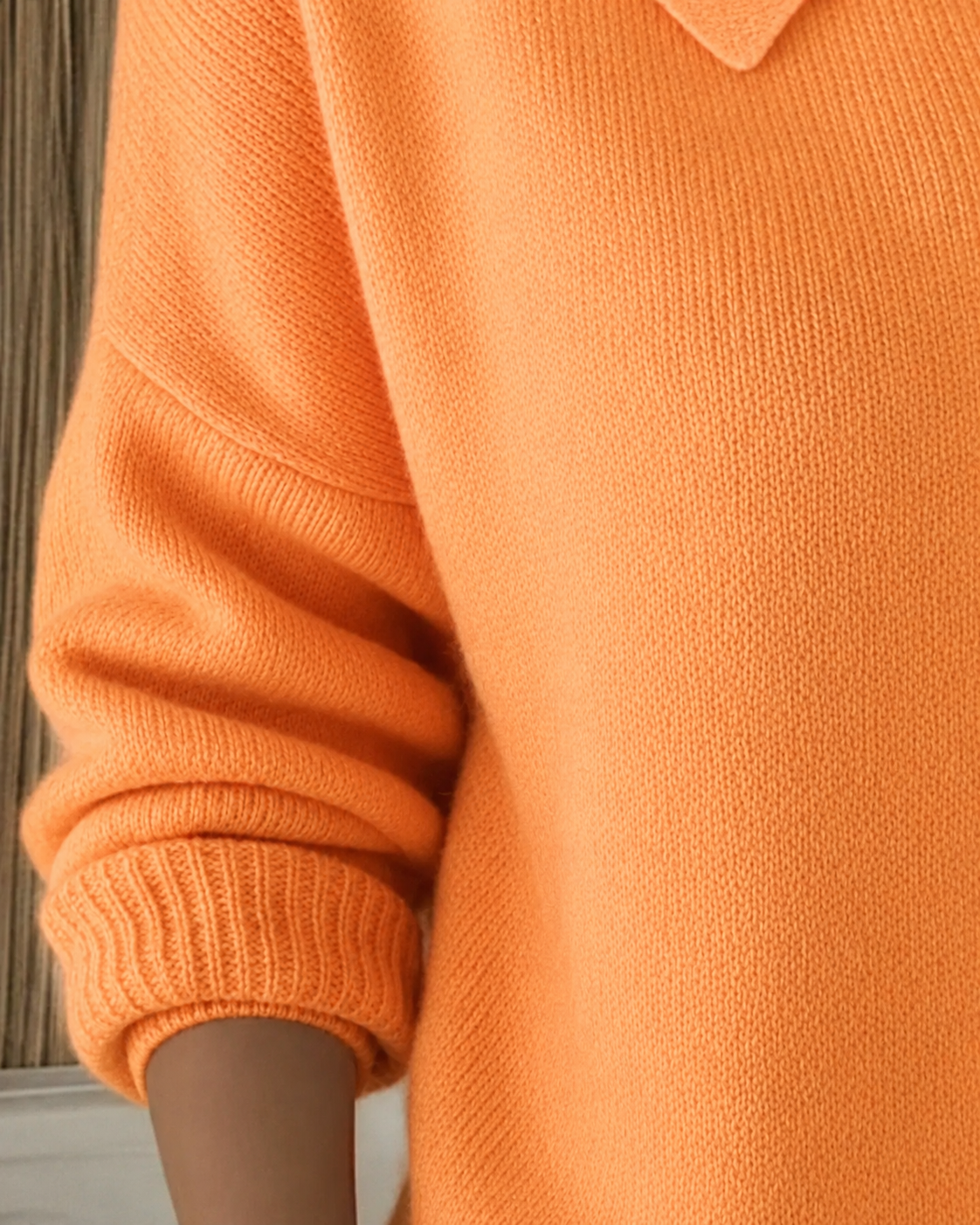 Knit cardigan photographed at an angle