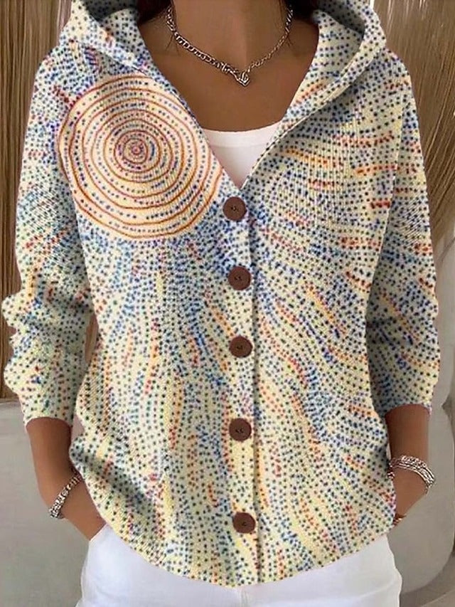 Long hooded cardigan photographed at an angle