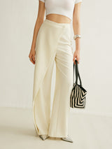 High-waisted wide-leg pants with an asymmetric wrap front, front view