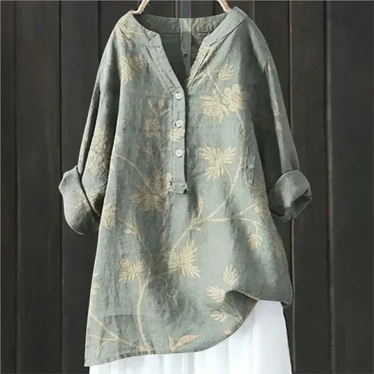 Floral wrap-neck tunic shown across the colour range