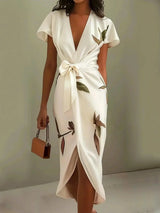 Floral wrap midi dress with a tie waist and V-neckline, front view