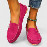 Slip-on loafers with moccasin stitching and a gold bar detail