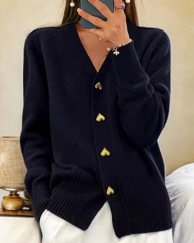 Heart-button V-neck cardigan shown from the side