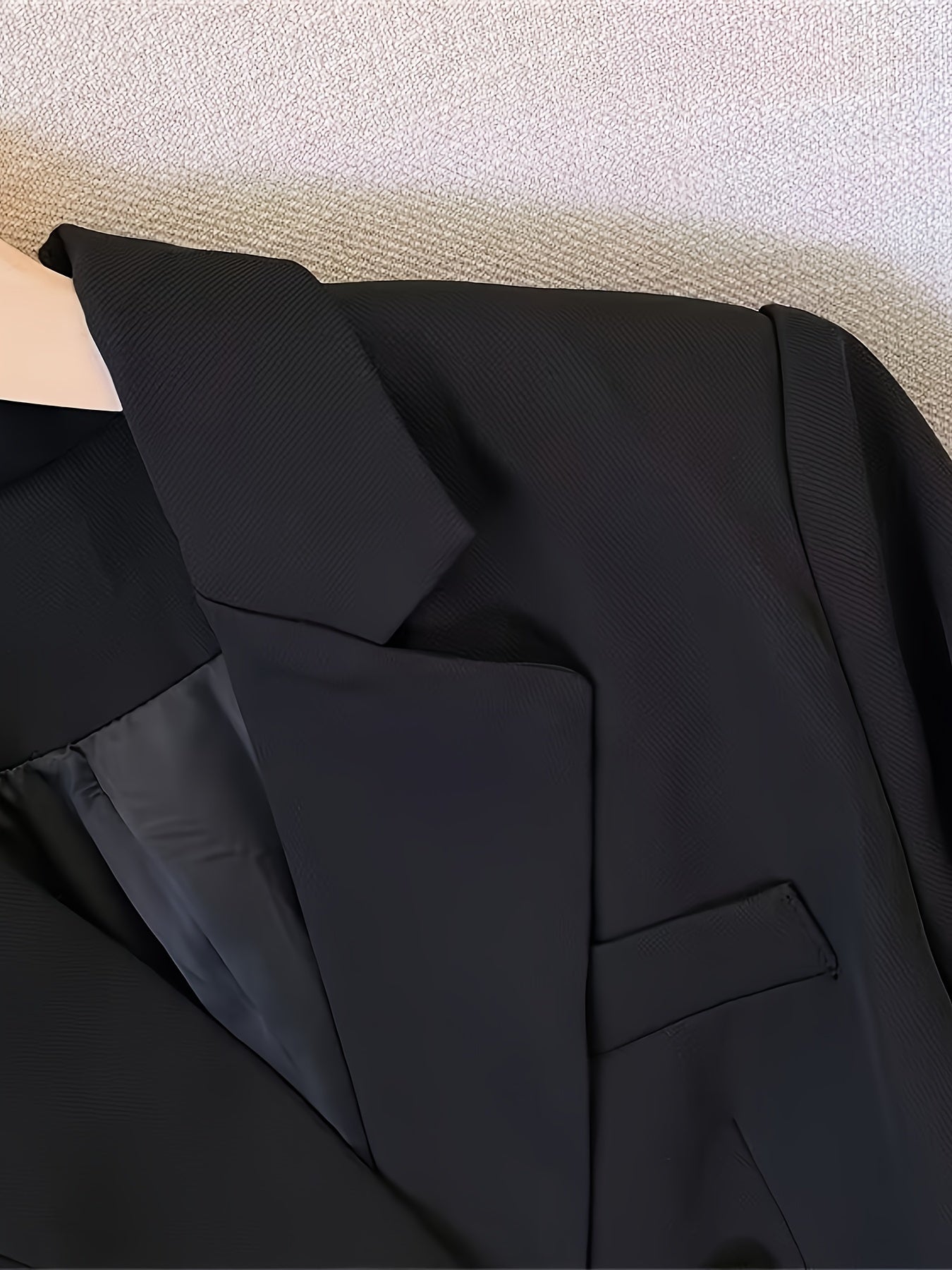 Double-breasted blazer shown at full length