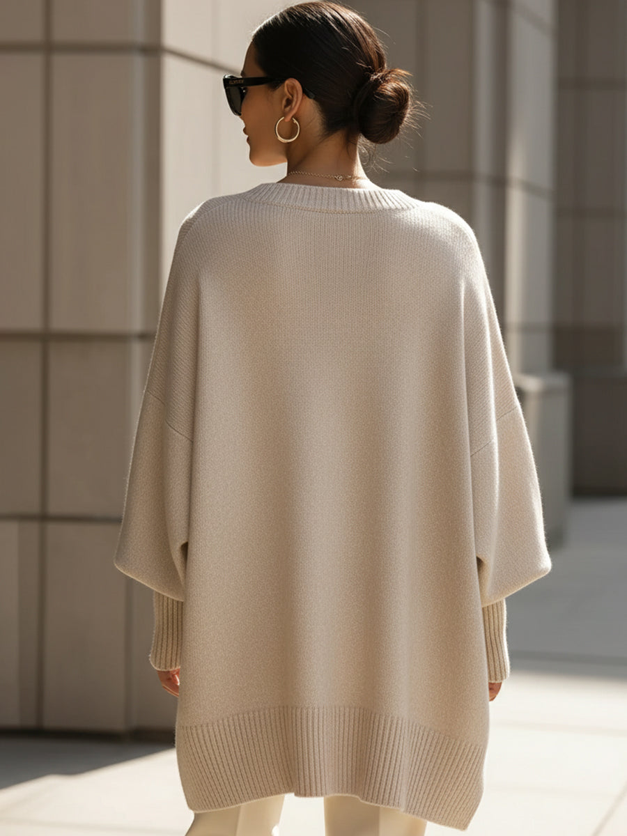 Draped poncho shown from the side
