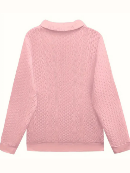 Cable-knit sweater shown in a seventh colourway