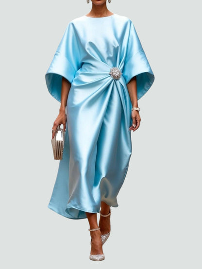 Midi dress showing the draped waist and wide sleeves