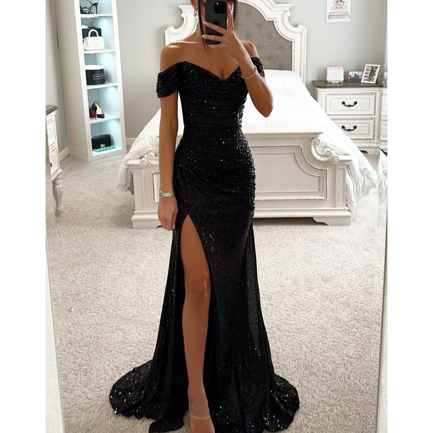 Off-shoulder sequin dress photographed at an angle