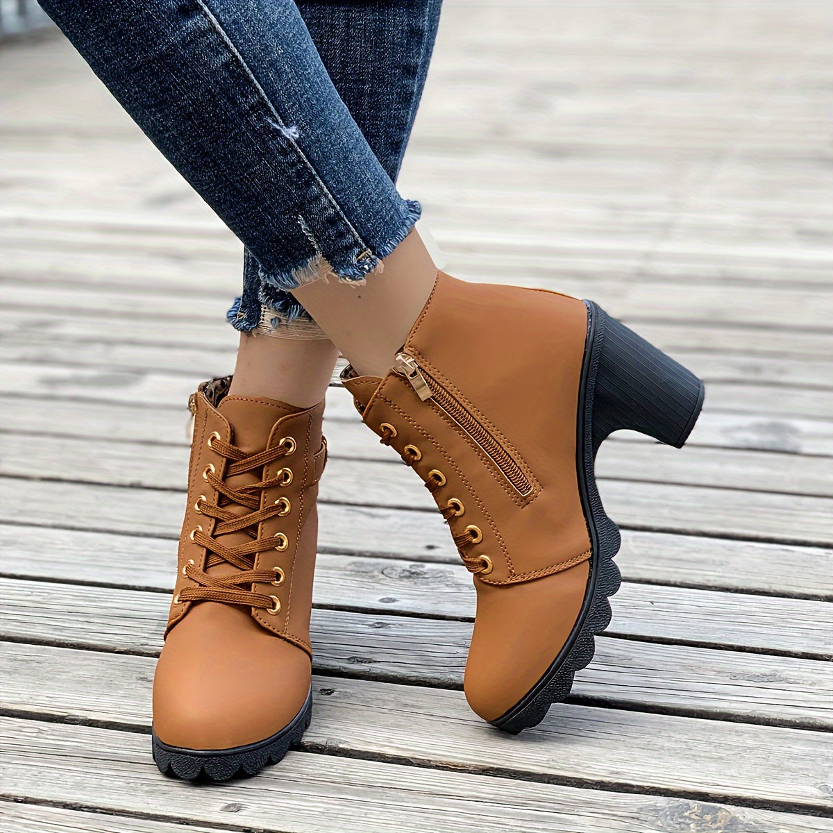 Ankle boots showing the side zip