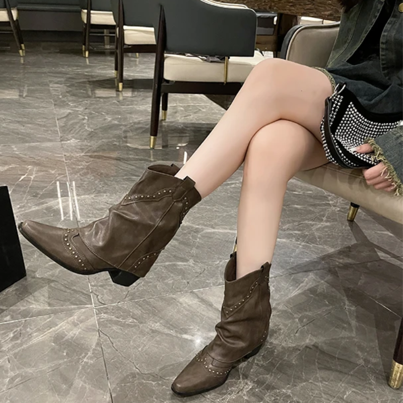 Studded western boots on a mid heel, side view