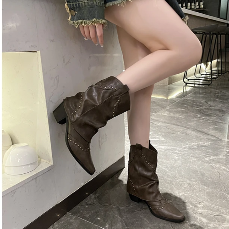 Western boots showing the studded rivet detail