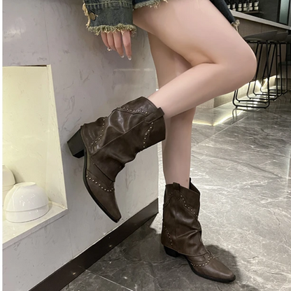 Western boots showing the studded rivet detail