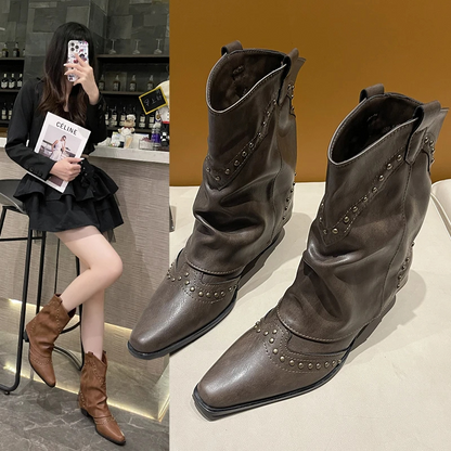 Studded boots shown from the side at full height