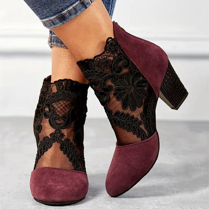 Ankle boots showing the block heel