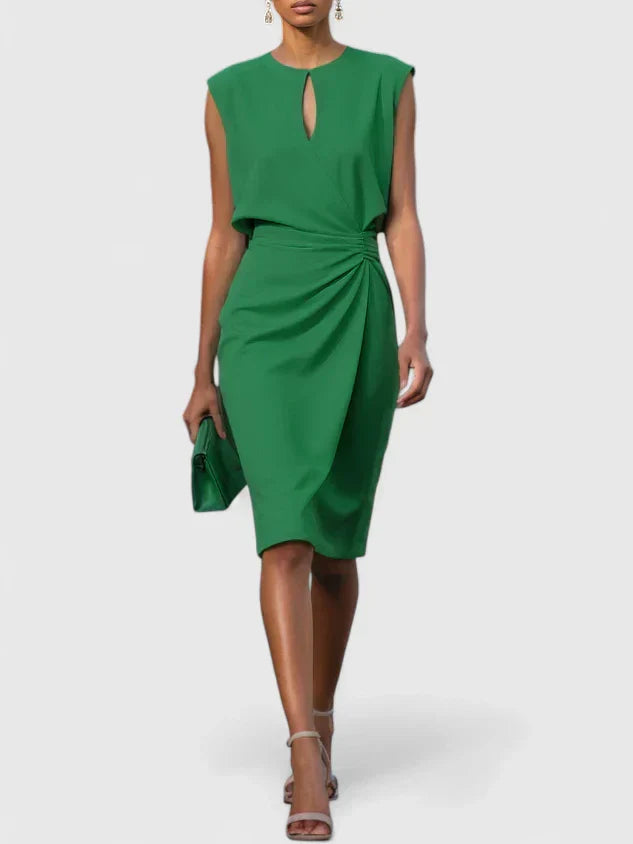 Midi cocktail dress showing the tailored waist
