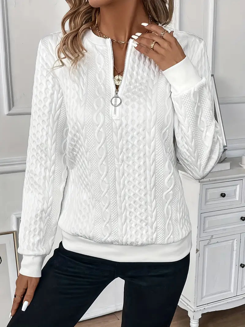 Zip-up sweater shown open at the front