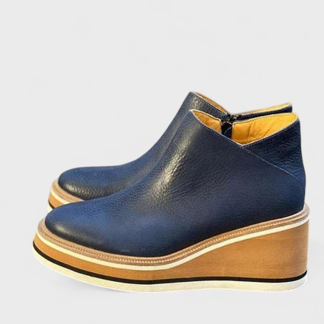 Ankle boots showing the zip closure