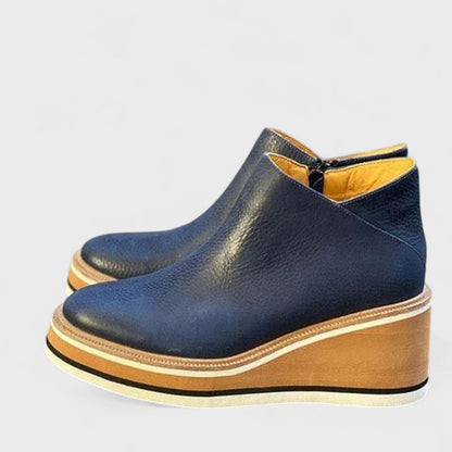 Ankle boots showing the zip closure