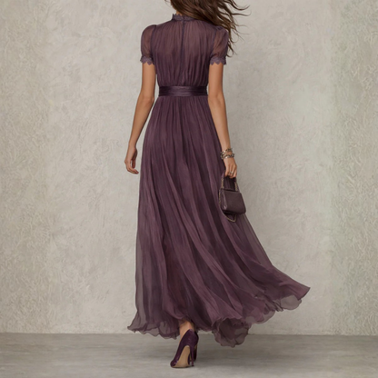 Tie-neck maxi dress shown from the side