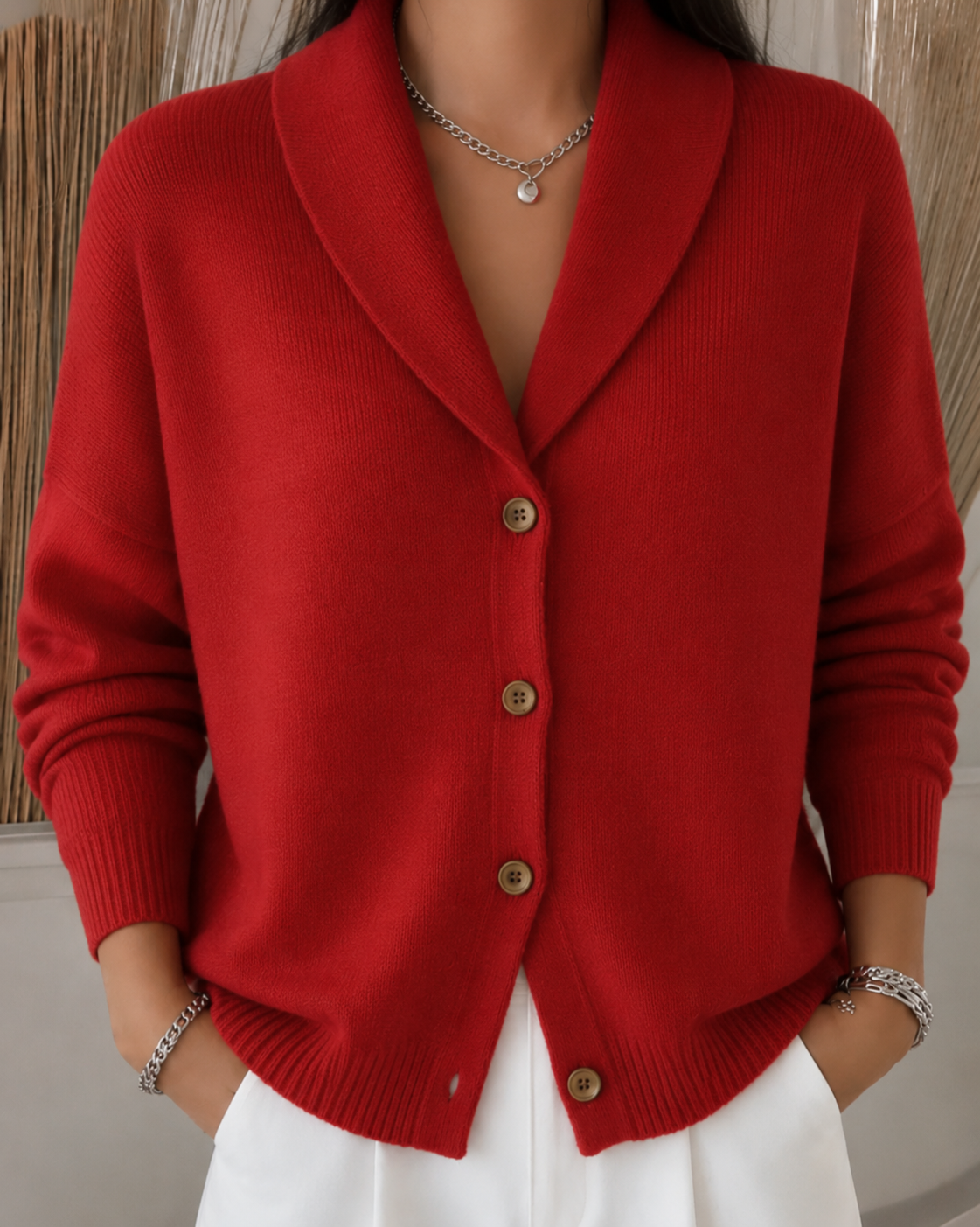 Cardigan showing the collar and button placket