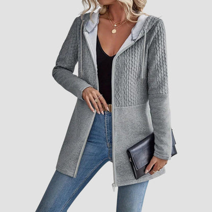 Full-zip hoodie shown in a styled setting