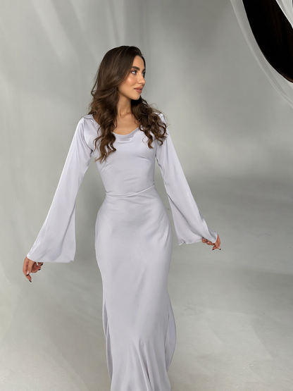Floor-length maxi dress showing the skirt flare