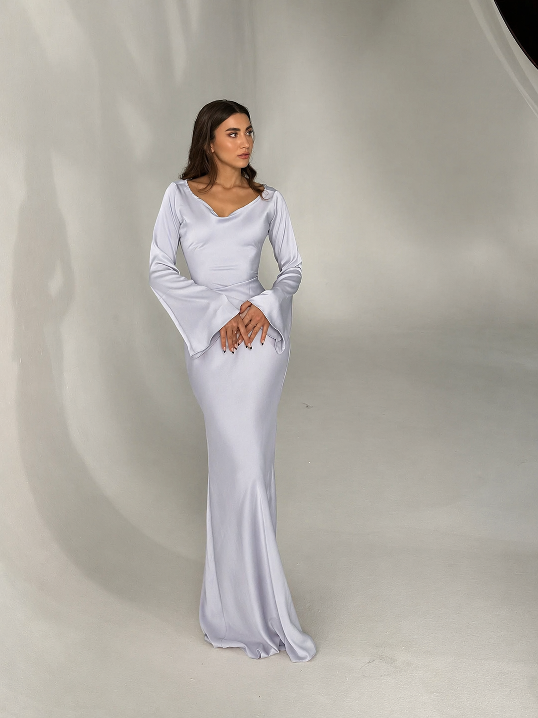Long-sleeve maxi dress showing the tailored bodice