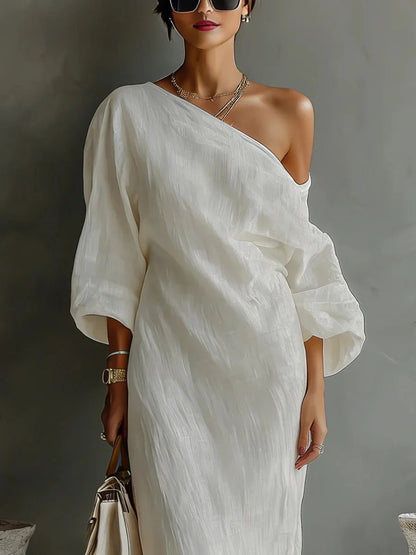 One-shoulder maxi dress with an asymmetrical hem, front view