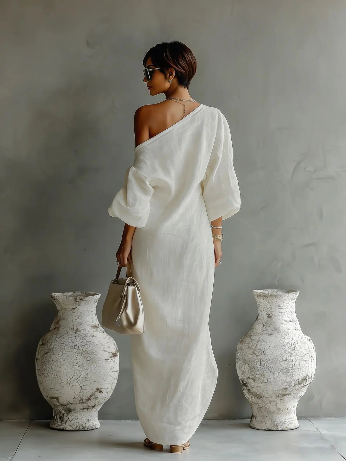 Asymmetrical maxi dress shown from the side