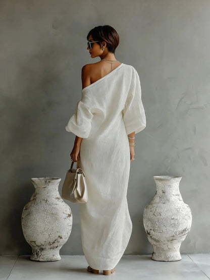Asymmetrical maxi dress shown from the side