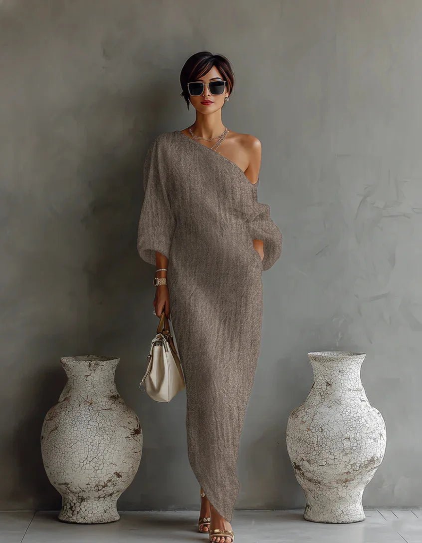 Asymmetrical maxi dress photographed at an angle