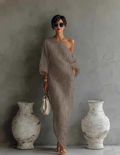 Asymmetrical maxi dress photographed at an angle
