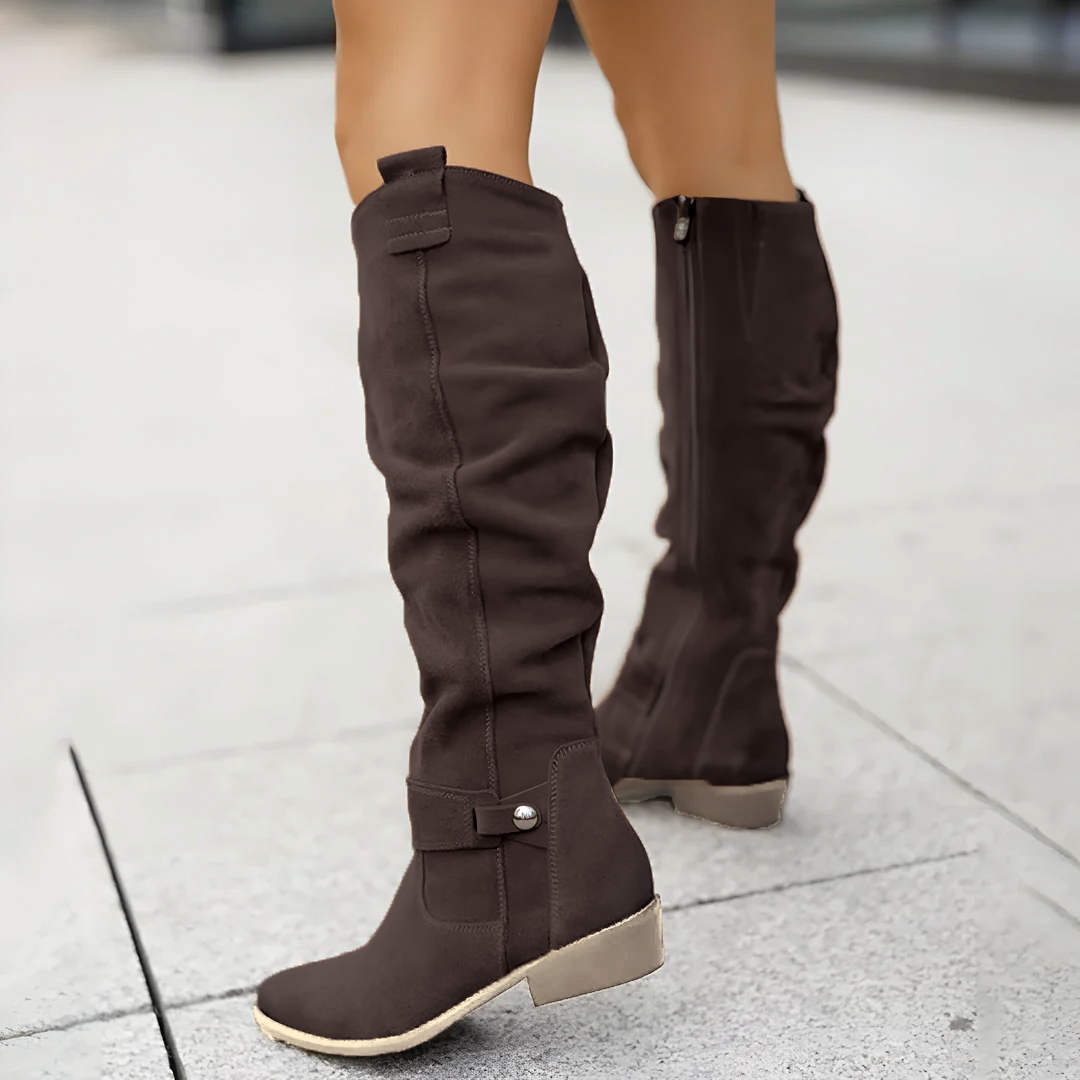 Slouchy knee-high riding boots shown in a third colourway