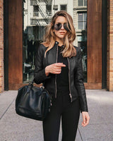 Slim biker jacket with a stand collar, side view