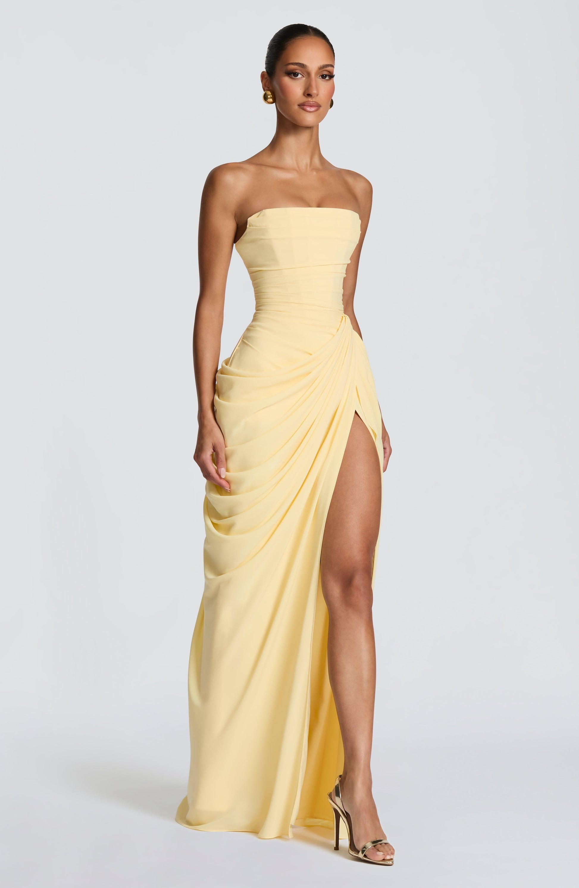 Strapless maxi dress showing the high leg slit