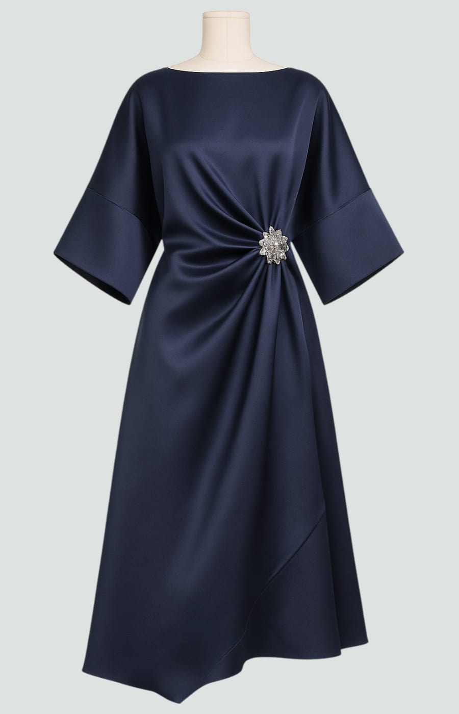Brooch-detail midi dress shown in a styled setting