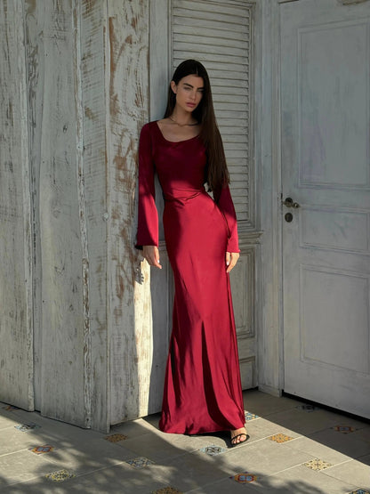 Floor-length gown showing the sleeve drape in motion