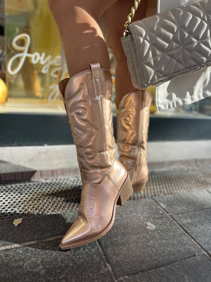 Metallic western boots shown at full height