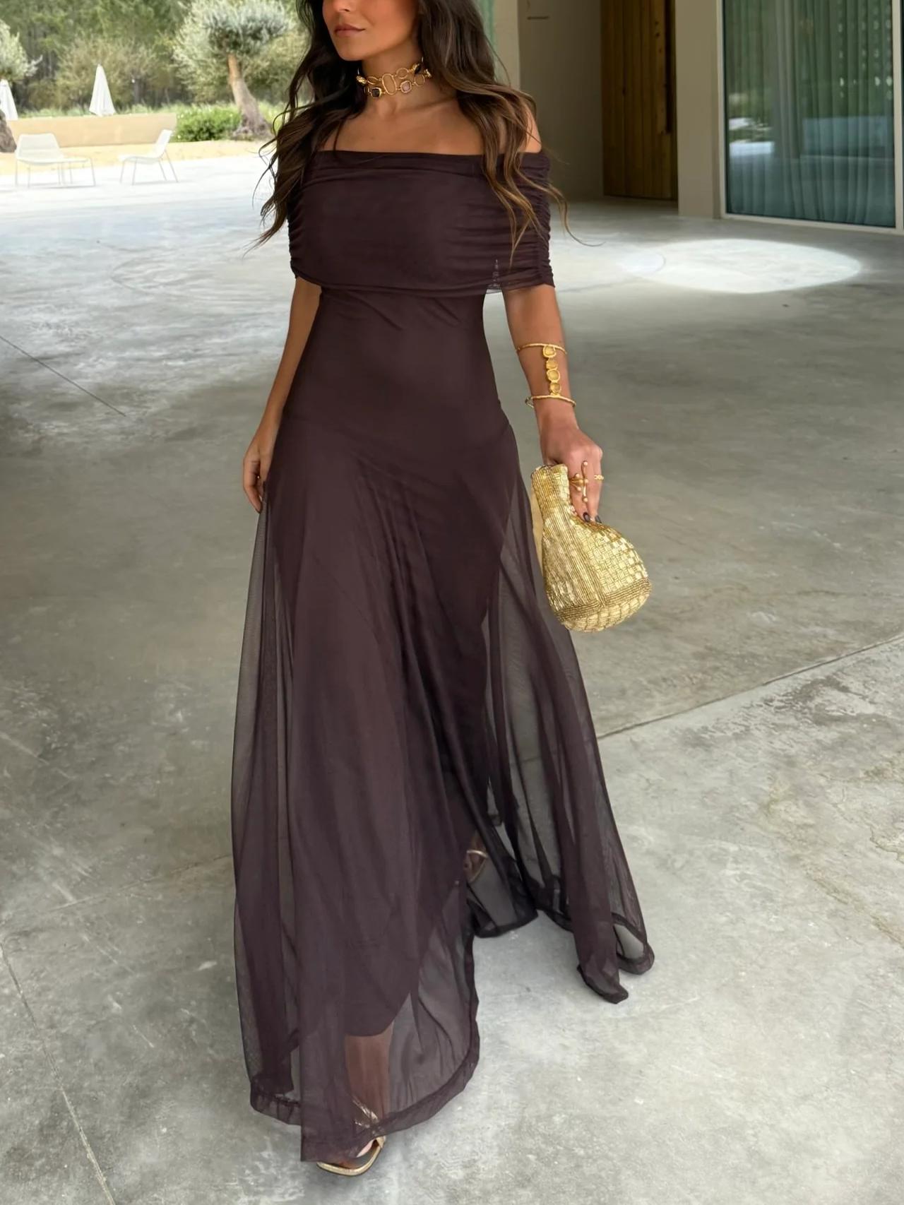 One-shoulder dress showing the sheer mesh overlay