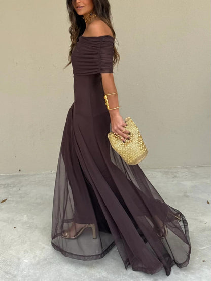 One-shoulder mesh dress seen at full length