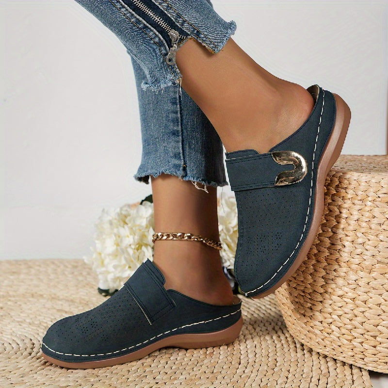 Flats showing the grippy sole underneath