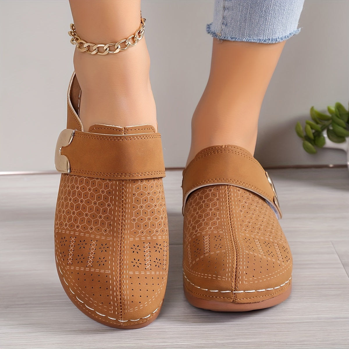 Slip-on flats photographed at a three-quarter angle