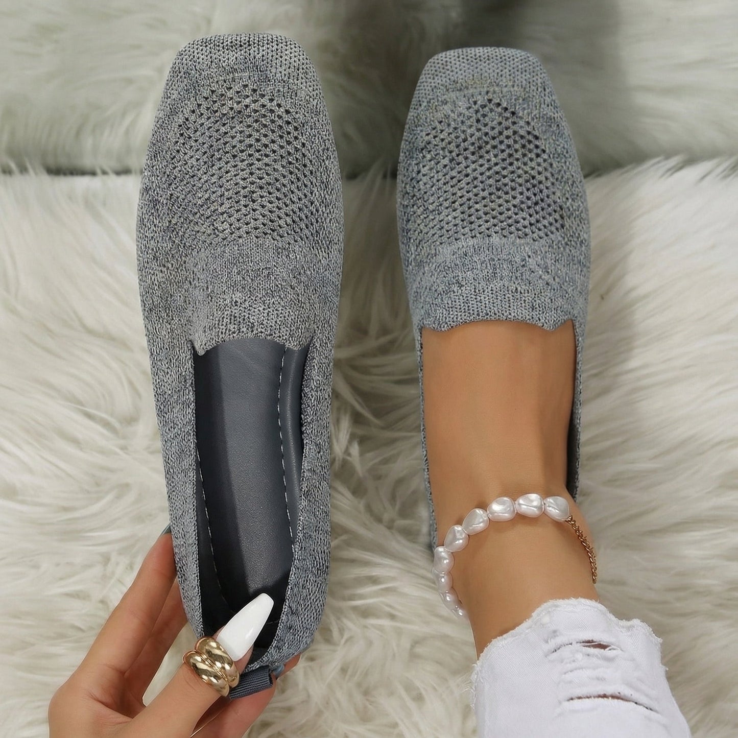 Perforated knit slip-on loafers with a rounded toe