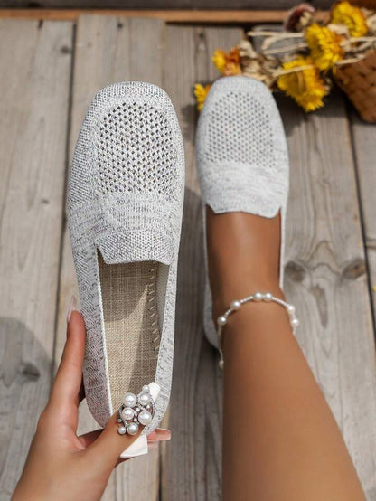 Pair of knit slip-on loafers shown together