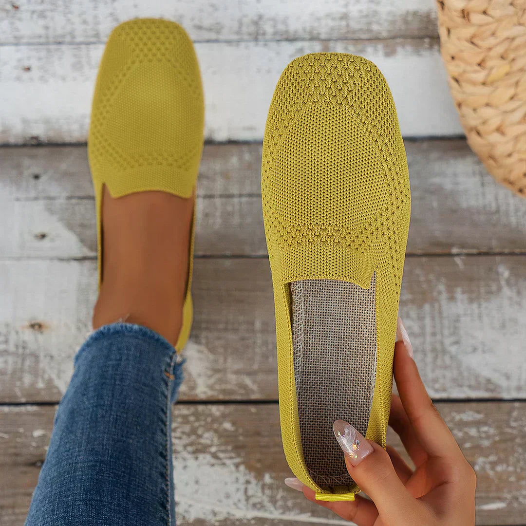 Close detail of the perforated knit on the top panel