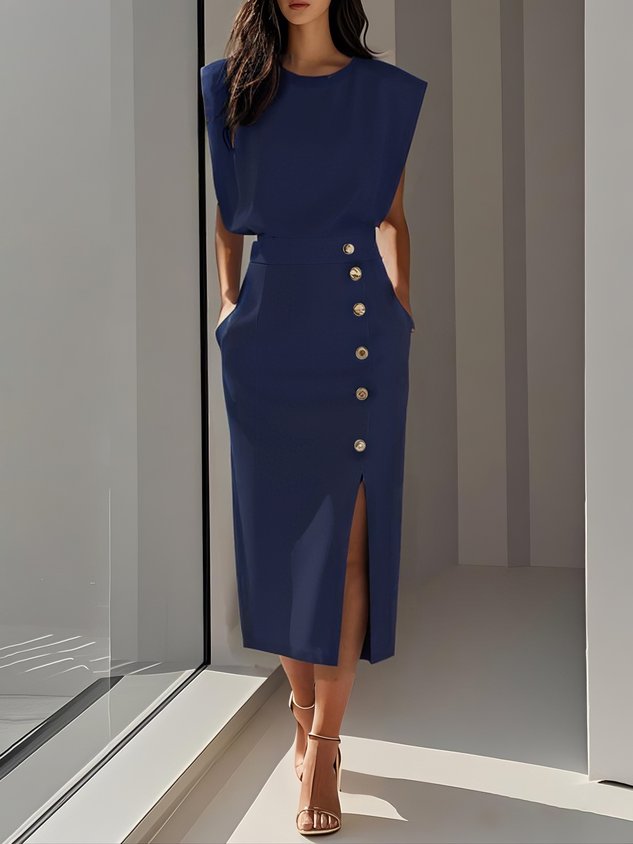 Sleeveless button-front dress shown standing