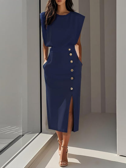 Sleeveless button-front dress shown standing