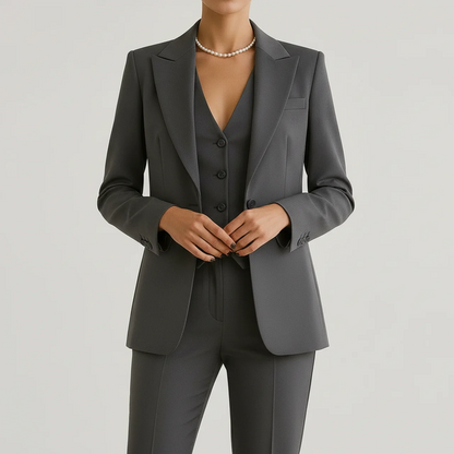 Three-piece suit shown with the blazer open
